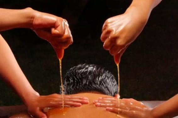 Pizhichil — Kerala oil bath therapy
